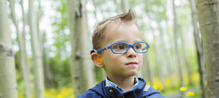 Boy with a hearing aid