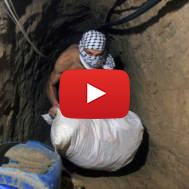Palestinians smuggle goods and food through tunnels from Egypt