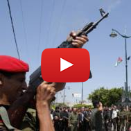 Palestinian shoots in the air