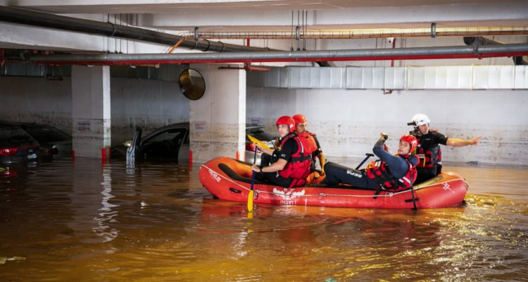 firefighters flood rescue boat