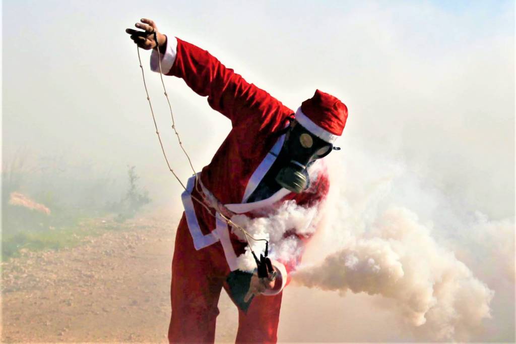 Palestinian Santa attacks Israelis with a slingshot