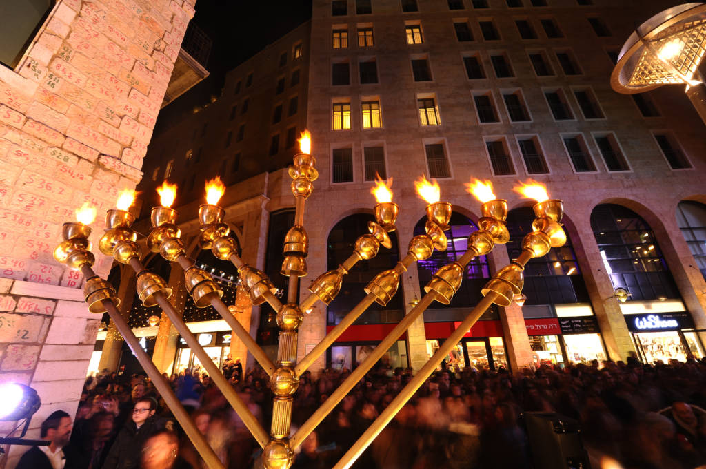 A public candle lighting ceremony in Jerusalem on the last night of Chanukah
