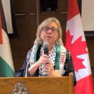 Elizabeth May at an event that hosted known antisemite and Holocaust denier Nazih Khatatba. (