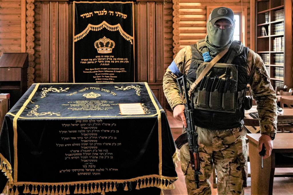 Ukrainian security forces inside the synagogue at the Anatevka