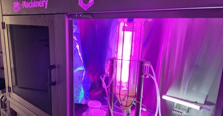 An encasement housing a series of bioreactors inside ReaGenics’ Ness Tziona lab