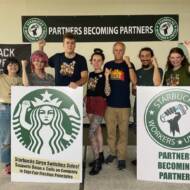 Jaz Brisack (R) and fellow Starbucks employees August 31, 2021.