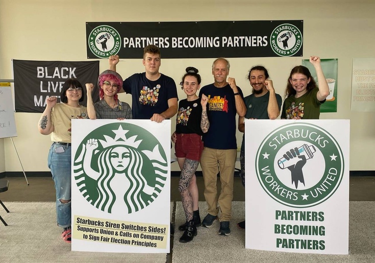 Jaz Brisack (R) and fellow Starbucks employees August 31, 2021.