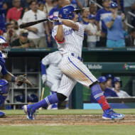 Team Israel's Garrett Stubbs hits a double