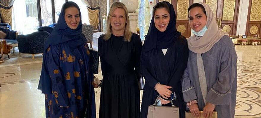 Doves—Women Making Peace CEO Valerie Leiser Greenfield (second from left) and Assistant Minister for Executive Affairs Princess Haifa Al Saud (in blue) in Riyadh