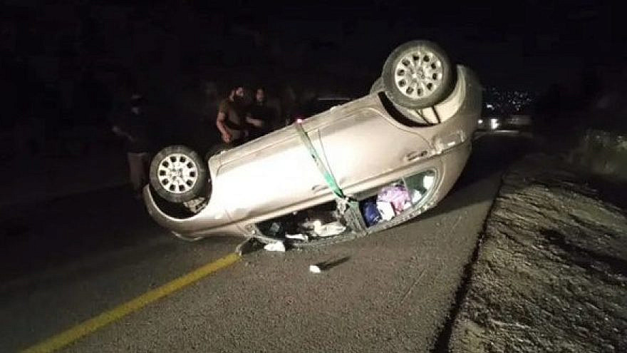 Car flips over during terror attack
