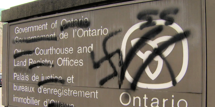 Antisemitic graffiti on a sign outside Ottawa courthouse