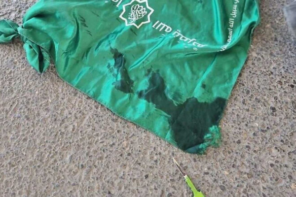 Hamas flag and knife of terrorist.