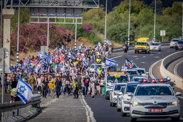 Hostage families march