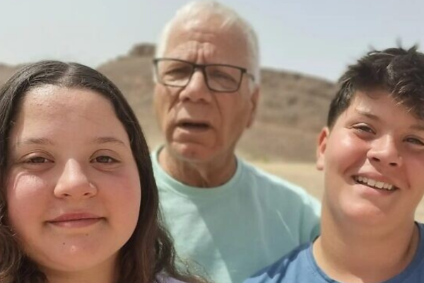 Liel (left), Avia (back) and Yanai Hetzroni, from Kibbutz Be'eri.