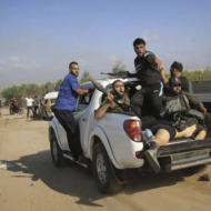 gazans with dead hostage