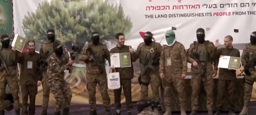 Hostages forced to participate in ceremony in Gaza. (YouTube screenshot)