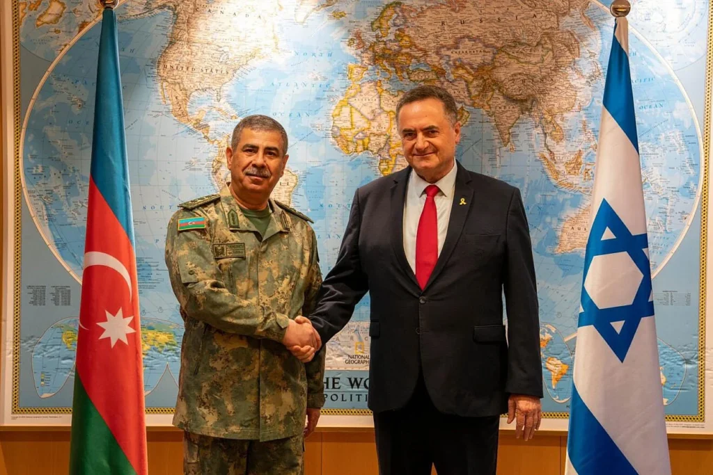 Azerbaijani Defense Minister Colonel General Zakir Hasanov (left) and Israeli Defense Minister Israel Katz