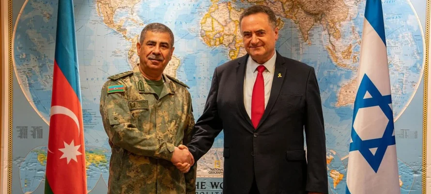 Azerbaijani Defense Minister Colonel General Zakir Hasanov (left) and Israeli Defense Minister Israel Katz