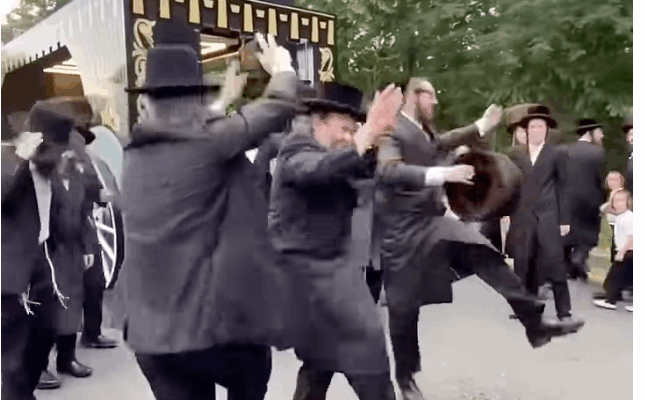 Orthodox Jews dancing